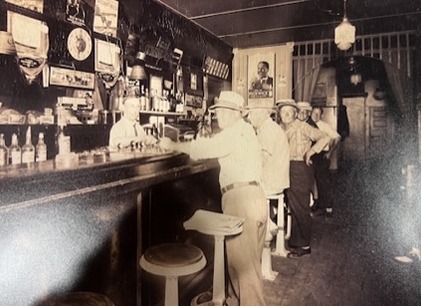 Patrons at the bar during Prohibition, same room as The Thirsty Whale today